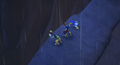 Sora, Donald, and Goofy watch the titan fall in the cutscene "The Rock Titan Rolls".