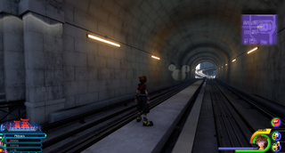 The City / North District: Climb onto the train tracks. Follow the tracks East to find the emblem on the wall of the tunnel.